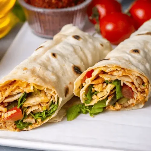 Delicious chicken salad wrap recipe with lean chicken, fresh veggies, and a low-carb tortilla, perfect for a healthy lunch.